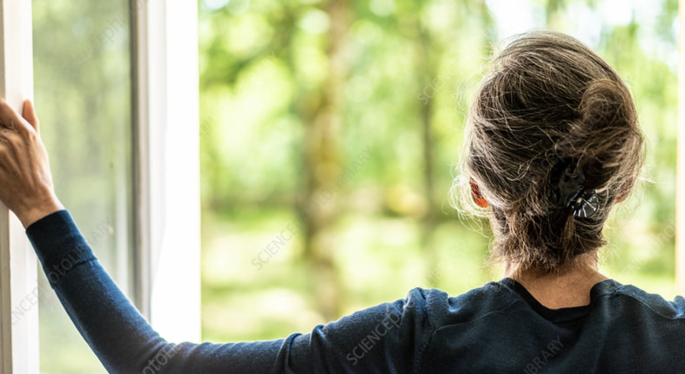 Woman opening window