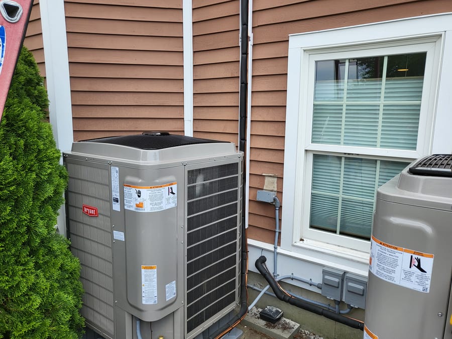 an HVAC unit sitting outside a house