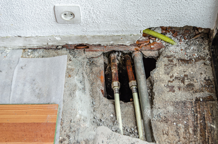 Floor pulled up to inspect foundation and repair slab leak.